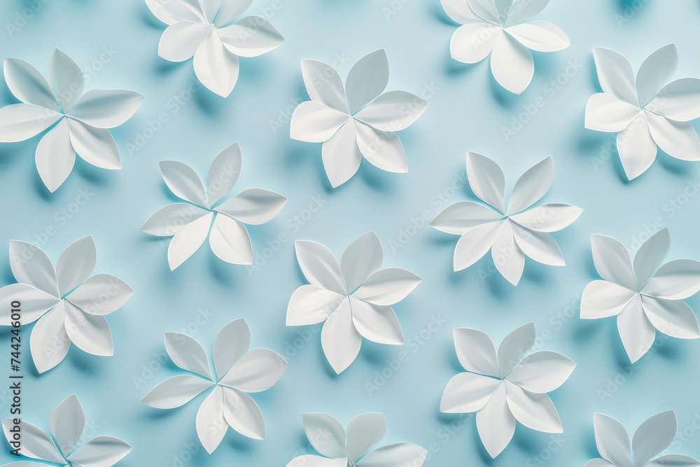 Floral pattern of white flowers on a pastel blue background. The concept of spring, nature and beauty. Floral pattern of white flowers on a pastel blue background. The concept of spring, nature and beauty.