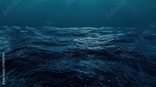 Dark blue ocean surface seen from underwater. Abstract waves underwater and rays of sunlight shining through. 3D illustration