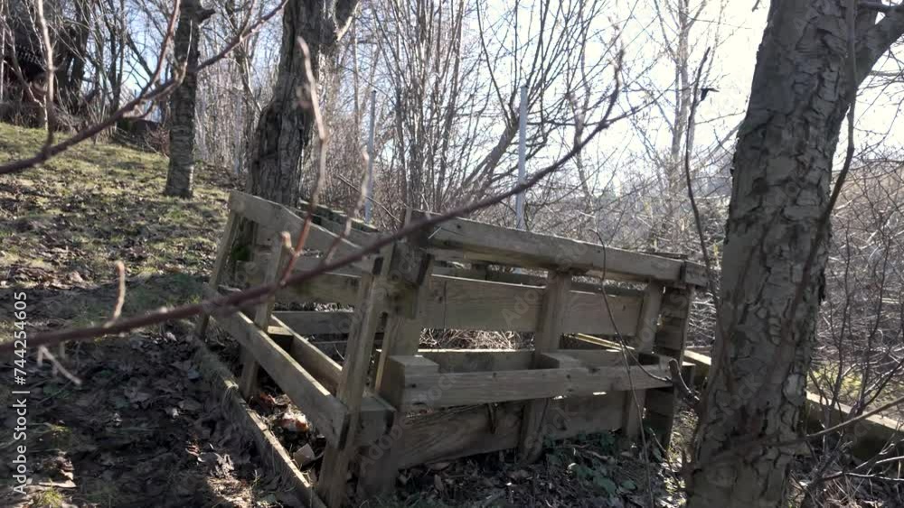 wooden pallet composter in garden. permaculture concept