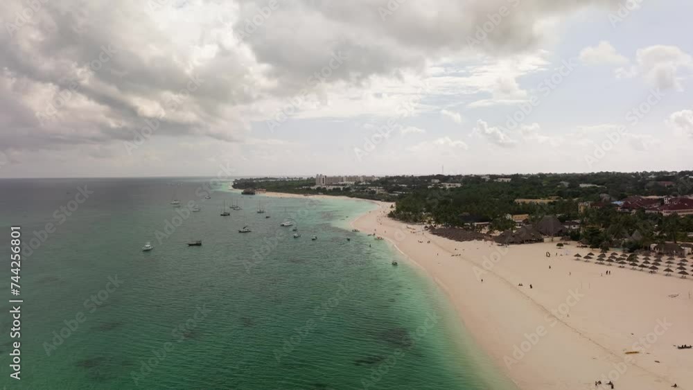 Panorama of the wonderful beach of Zanzibar, summer concept, carefree holiday, Africa, Tanzania.motion-lapse shot at 24 fps Panorama of the wonderful beach of Zanzibar, summer concept, carefree holiday, Africa, Tanzania.motion-lapse shot at 24 fps