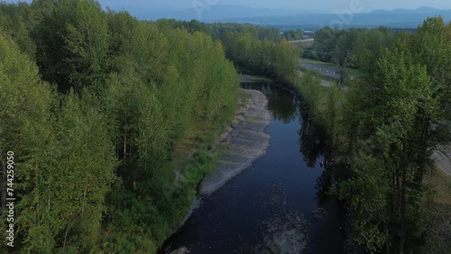 Aerial Perspective of Bulkley River Flowing Beside Yellowhead Highway near Houston, Northwood Picnic Site, with Bridge in View. photo