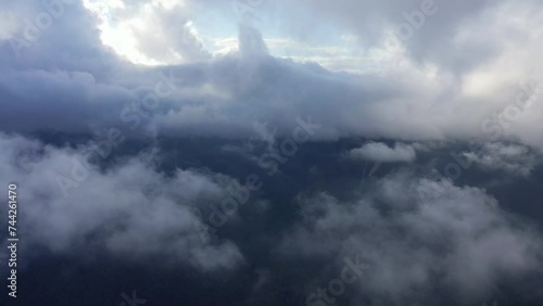 Clouds over dark forests , Asia, Philippines, Ifugao, Luzon, towards Banaue, in summer on a sunny day. photo