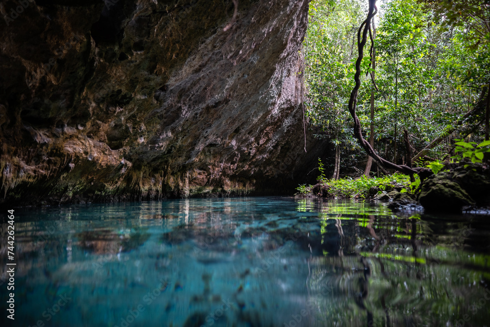 Underground caving and swimming in Sac Actun cave system in Tulum Mexico Underground caving and swimming in Sac Actun cave system in Tulum Mexico