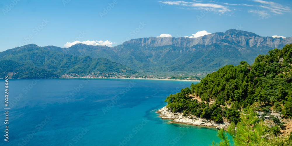 Scenic ocean shore with mountains in Thassos, Greece