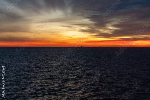 sunset over the ocean © Pintsized