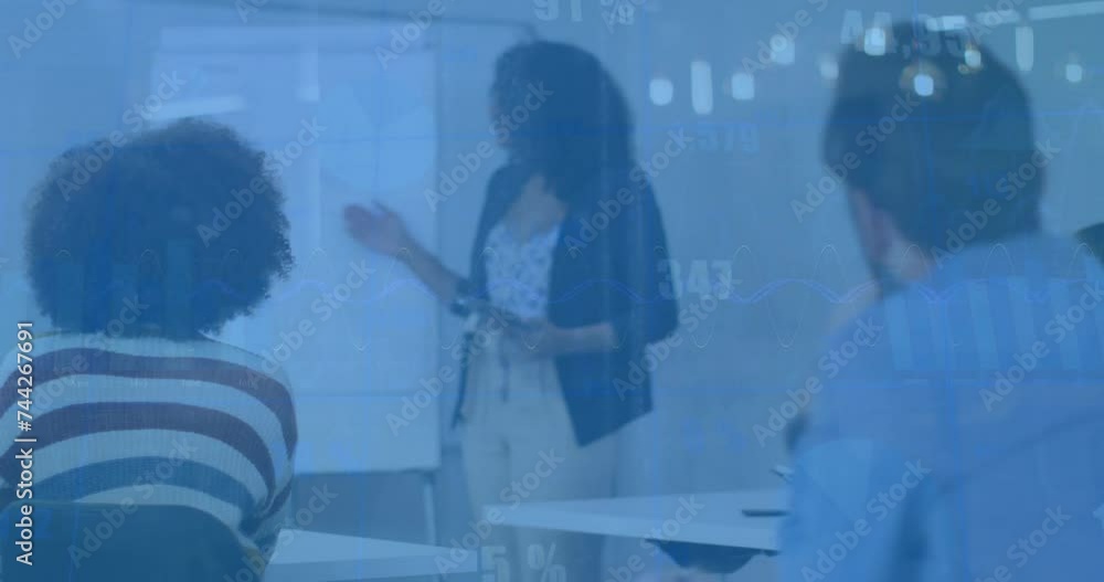 Animation of financial data processing over diverse business people in office Animation of financial data processing over diverse business people in office
