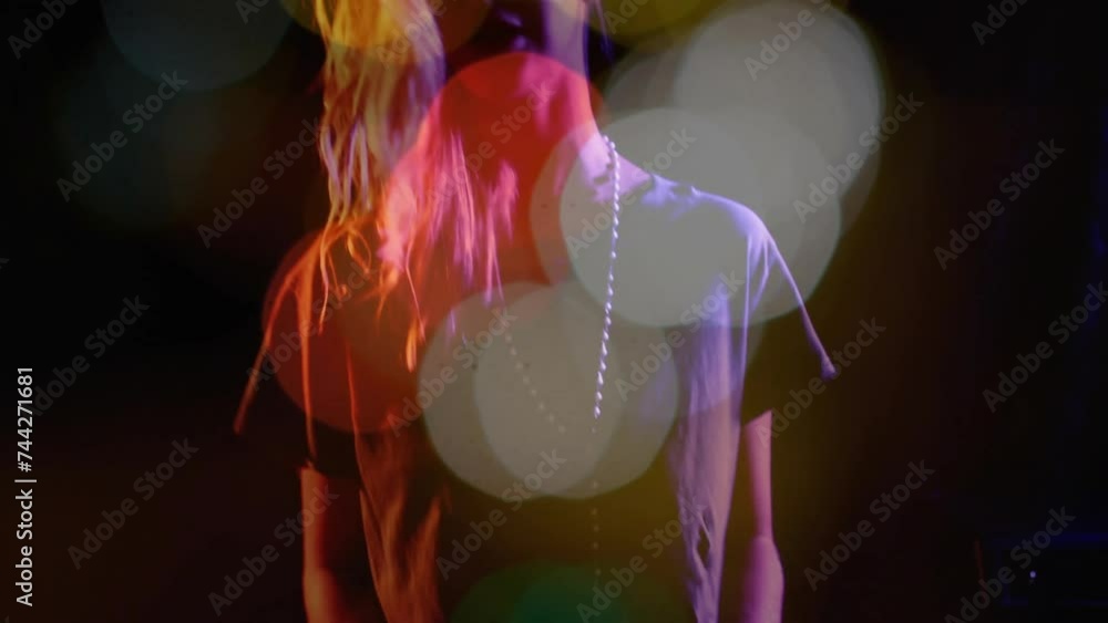 Animation of light spots over caucasian woman singing Animation of light spots over caucasian woman singing