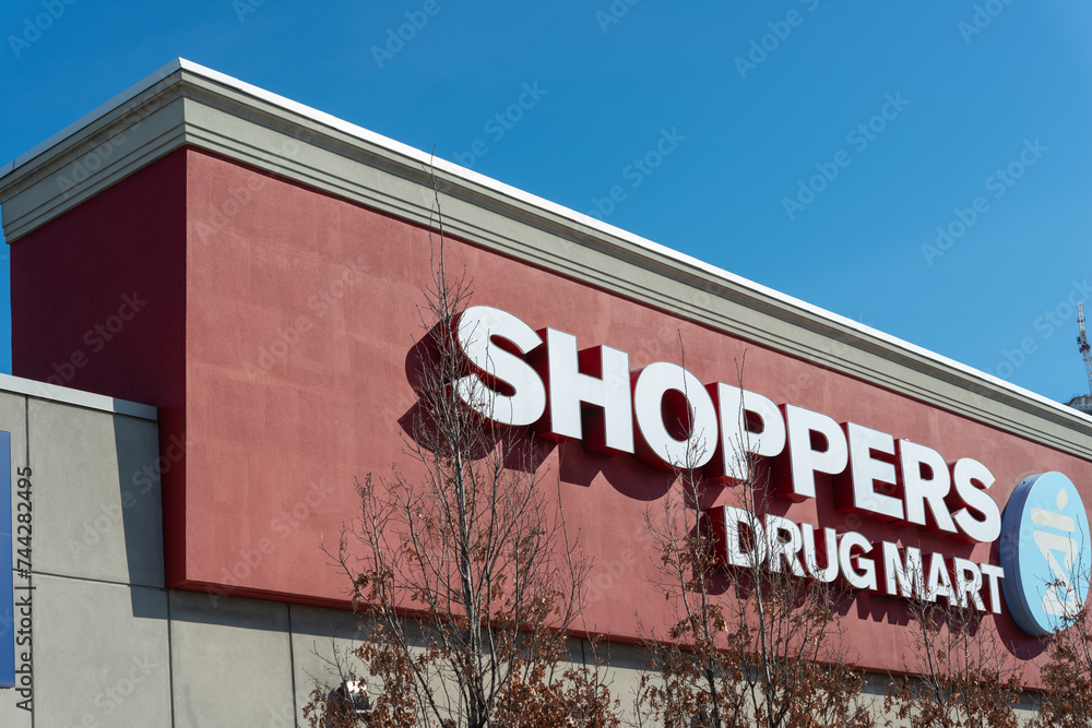 exterior building facade and sign of Shoppers Drug Mart, a ubiquitous