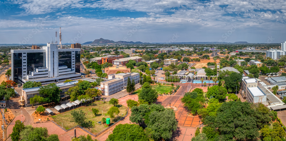 gaborone aerial view, government enclave and the bus rank with the department of immigration and the house of the parliament - obrazy, fototapety, plakaty 