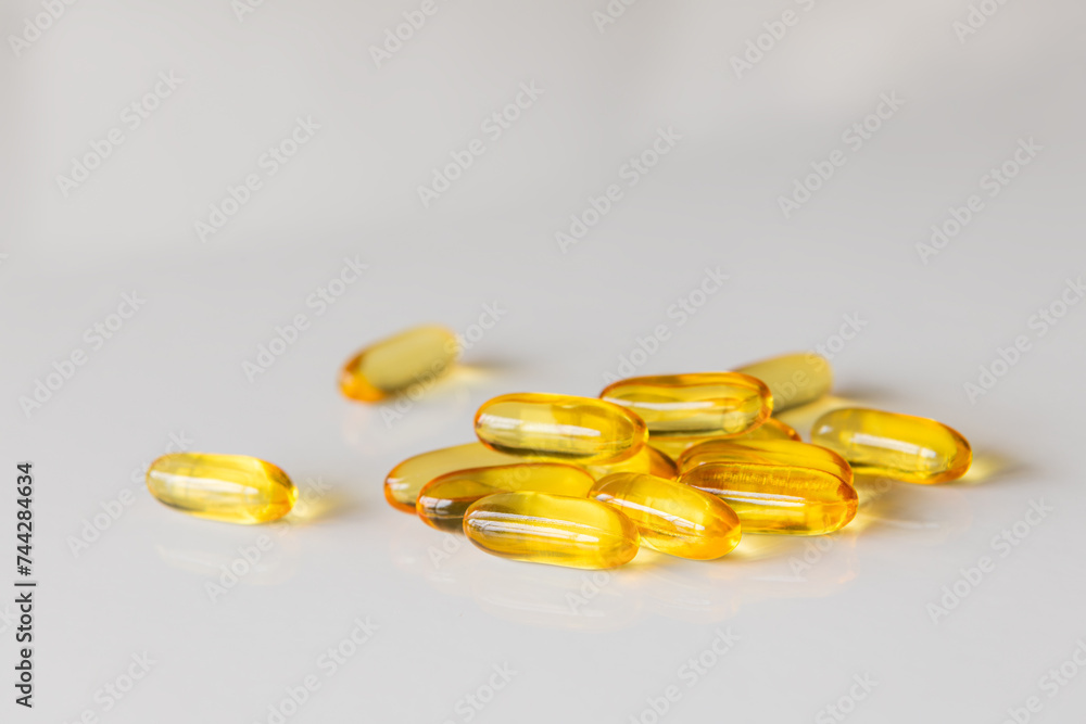 Medicine pills, drugs in different colours arranged on a white background. Health care medical concept. Medicine pills, drugs in different colours arranged on a white background. Health care medical concept.
