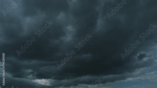 Black Of Rainstorms Clouds. Cumulonimbus Clouds Moving In Cloudy Dark Sky. Dramatic Thunderstorm Cloudscape. photo