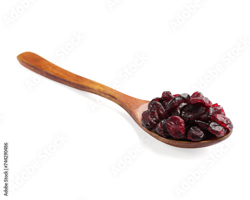 Spoon with dried cranberries isolated on white