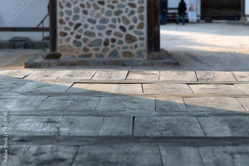 a wooden floor of the balcony in a traditional Korean building