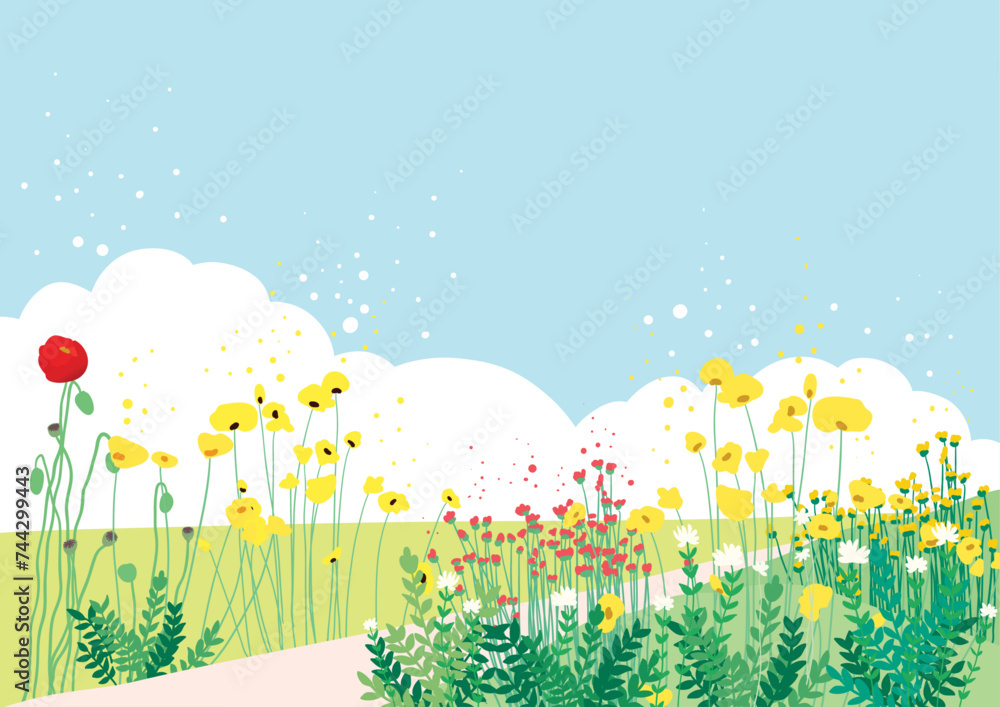 언덕길 사이로 노랑꽃과 빨강꽃이 어우러진 화장한 봄날 풍경
