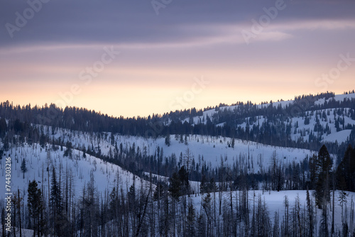 majestic sunset in the mountains overlooking snowy hills in central idaho near idaho city 