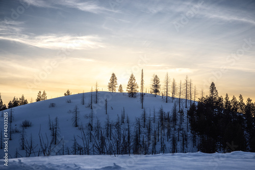 majestic sunset in the mountains overlooking snowy hills in central idaho near idaho city  © Sean