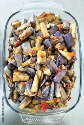 Terong Balado or balado eggplant is a Indonesian traditional food from Minangkabau, West Sumatra. Purple eggplant cut into pieces then fried and mixed with sambal or cabe giling
