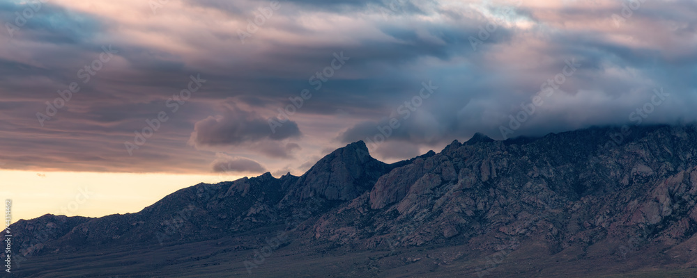 Panoramic American Landscape during a cloudy sunrise. El Paso, New Mexico, United States