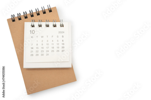 Simple desk calendar for OCTOBER 2024 and blank memo isolated on white background. Calendar concept with copy space.