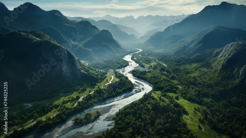 Aerial view of a curvy river and majestic mountains