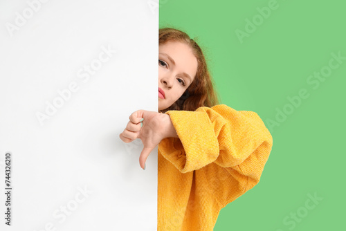 Young woman with blank post...