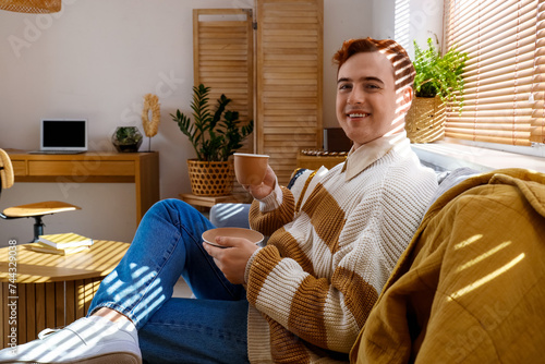 Redhead young happy man wit...