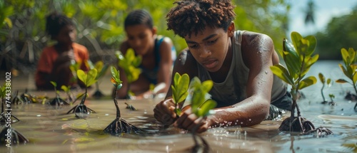 Youth planting mangroves to combat coastal erosion and protect marine habitats, illustrating the role of young people in conservation.