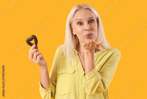 Mature woman with heart-sha...