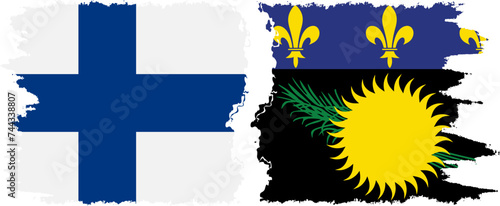 Guadeloupe and Finland grunge flags connection vector