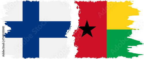 Guinea Bissau and Finland grunge flags connection vector