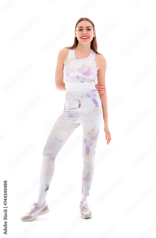 Beautiful young happy woman in sportswear isolated on white background Beautiful young happy woman in sportswear isolated on white background