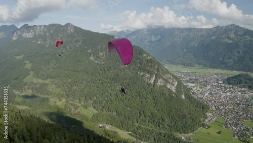 Flying over Switzerland with paragliders 