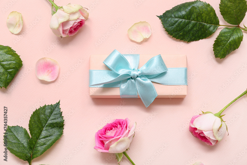 Gift box and beautiful roses on pink background. International Women's Day Gift box and beautiful roses on pink background. International Women's Day