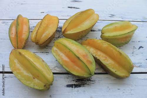 Several star fruit on the table

 photo