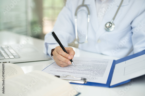 medical writer or medical communicator are writing clinical trial documents that describe research results, product use, and other medical information. photo