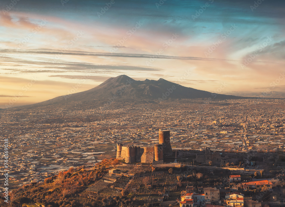 sunset over the city of naples and castle, lettere italy
