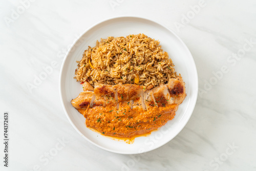 grilled chicken steak with red curry sauce and rice