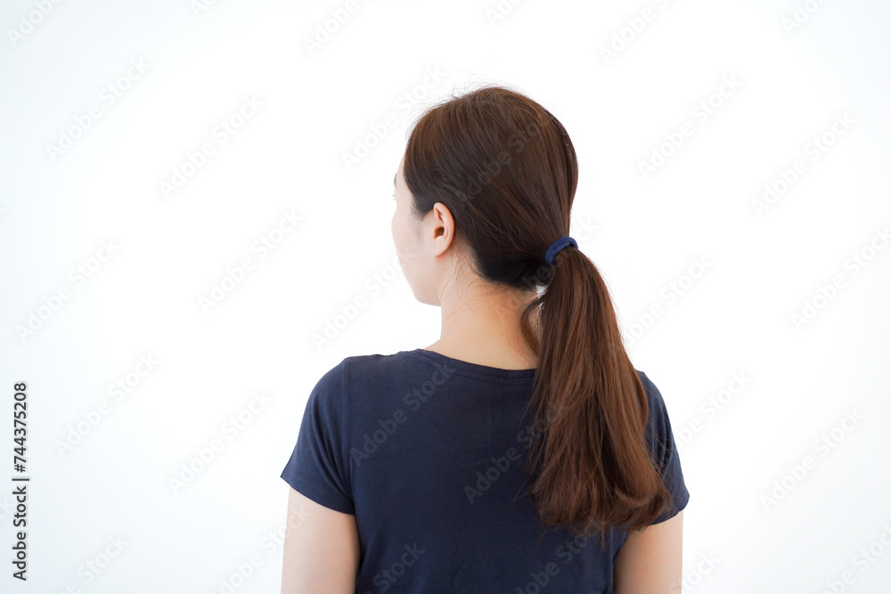 Smart and good looking Asian beautiful young woman in dark blue color t-shirt portrait. Smart and good looking Asian beautiful young woman in dark blue color t-shirt portrait.