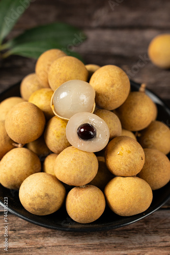 fresh peeled longans fruit on table.