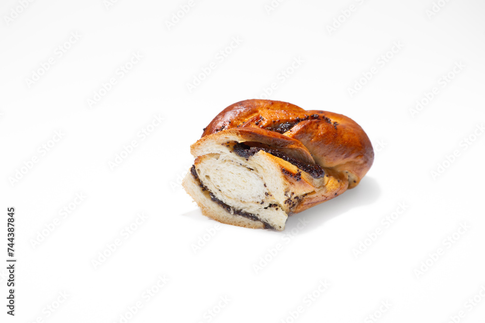 Sweet bun in a section on a white background. Vikrutas bun from Berdyansk bakery