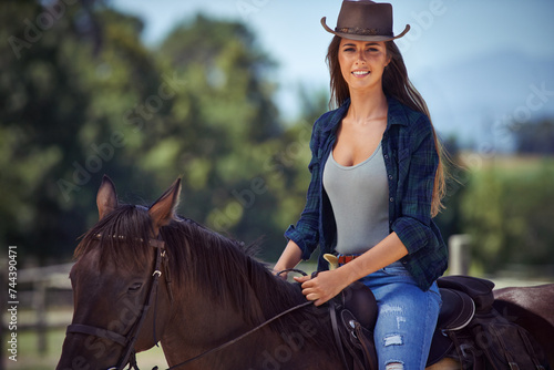Woman, portrait and horse or countryside ranch in nature as equestrian for adventure, training or cowboy hat. Female person, saddle and western cowgirl in Texas or farm environment, outdoor or rural