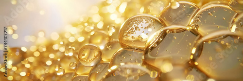 gold yellow bubbles, molecules with floating gold bubbles, Collagen Skin Serum and Vitamin bubbles in water, playful and vibrant, for beauty skin care cosmetics, spa products, or feminine brand,banner photo