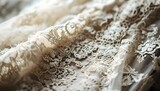 a close up of a white lace on a piece of cloth