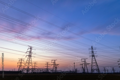 The pylons are in the evening, Substation in the evening, High voltage substation and beautiful sunset glow