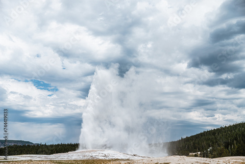 View of Old Faithful erupting at Yellowstone National Park