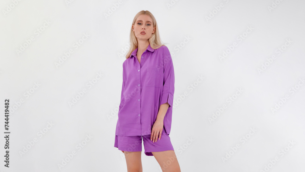 Beautiful fashionable girl in a summer suit. Clothes catalogue. White background. Fashion catalog Beautiful fashionable girl in a summer suit. Clothes catalogue. White background. Fashion catalog