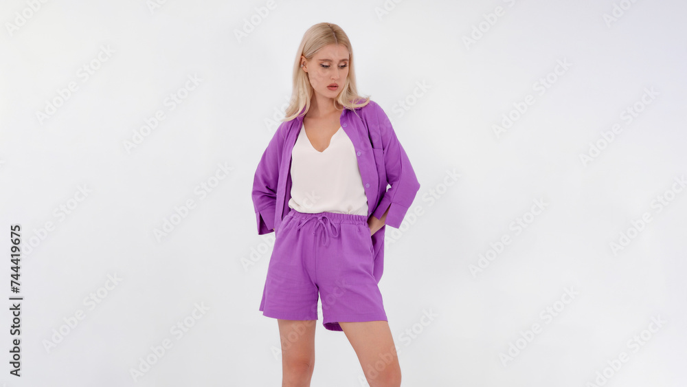 Beautiful fashionable girl in a summer suit. Clothes catalogue. White background. Fashion catalog Beautiful fashionable girl in a summer suit. Clothes catalogue. White background. Fashion catalog