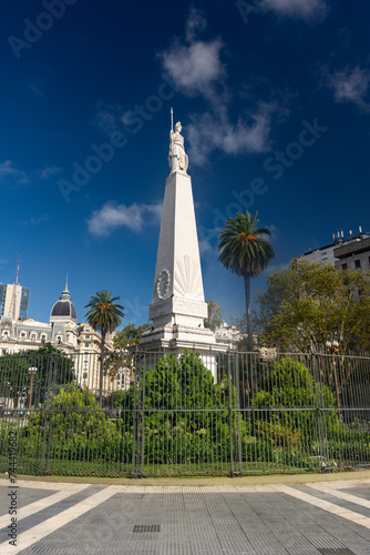 Beautiful view to white monument with statue in Plaza de Mayo