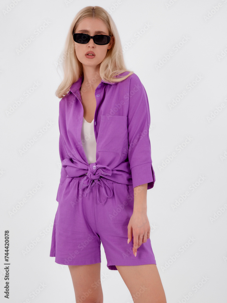 Beautiful fashionable girl in a summer suit. Clothes catalogue. White background. Fashion catalog
Beautiful fashionable girl in a summer suit. Clothes catalogue. White background. Fashion catalog