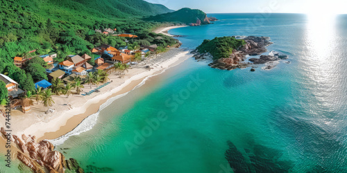  an aerial view of a fishing village and beach,